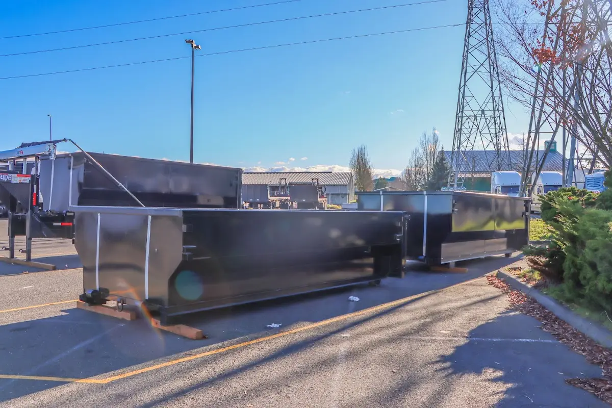 Roll-off dumpster ready for waste disposal at job site for Demolition Dumpster Rental in Attica